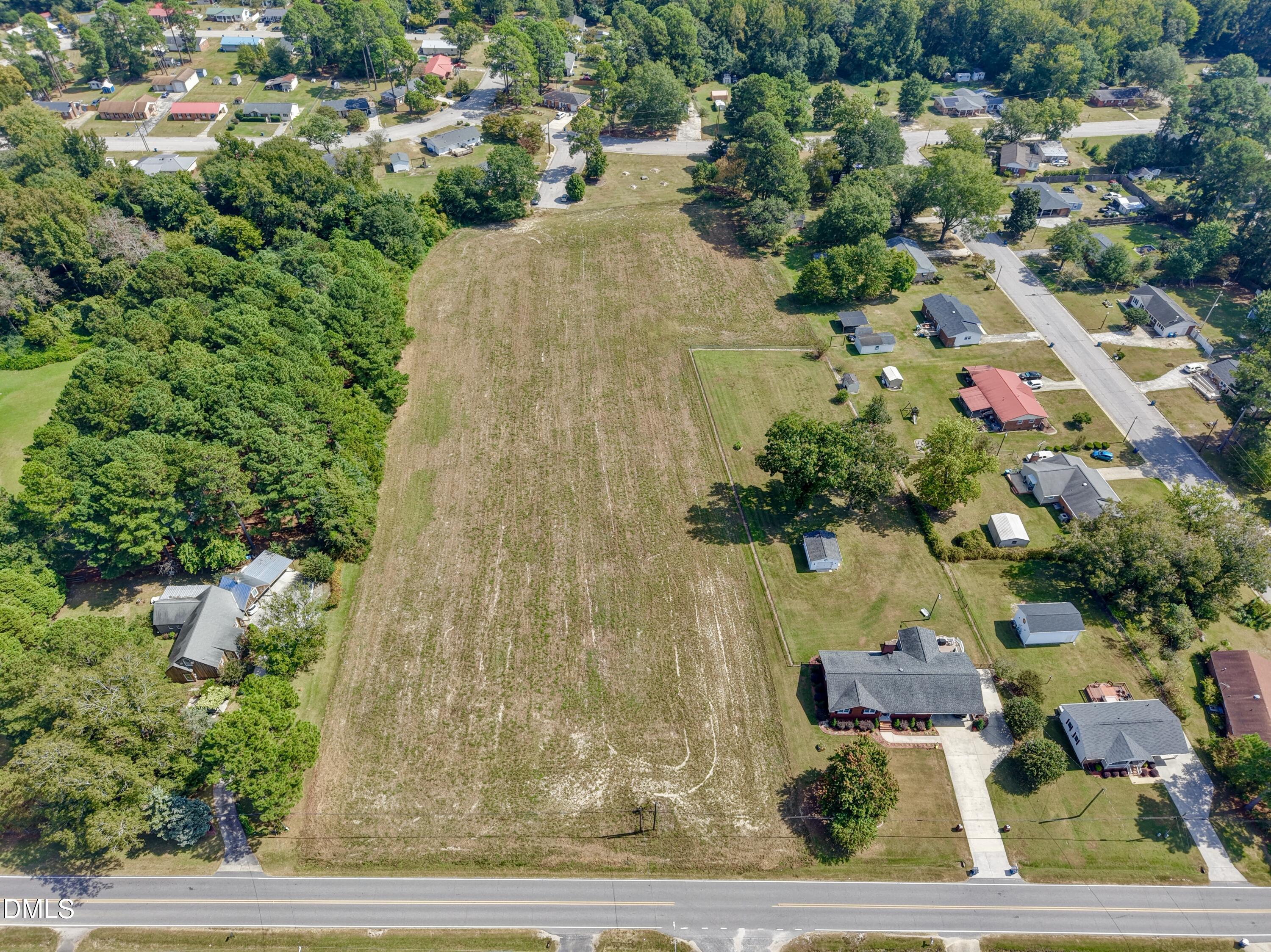 4.47-ac Fairground Road Dunn, NC 28334 - Photo 2 of 23 a picture of a yard with plants