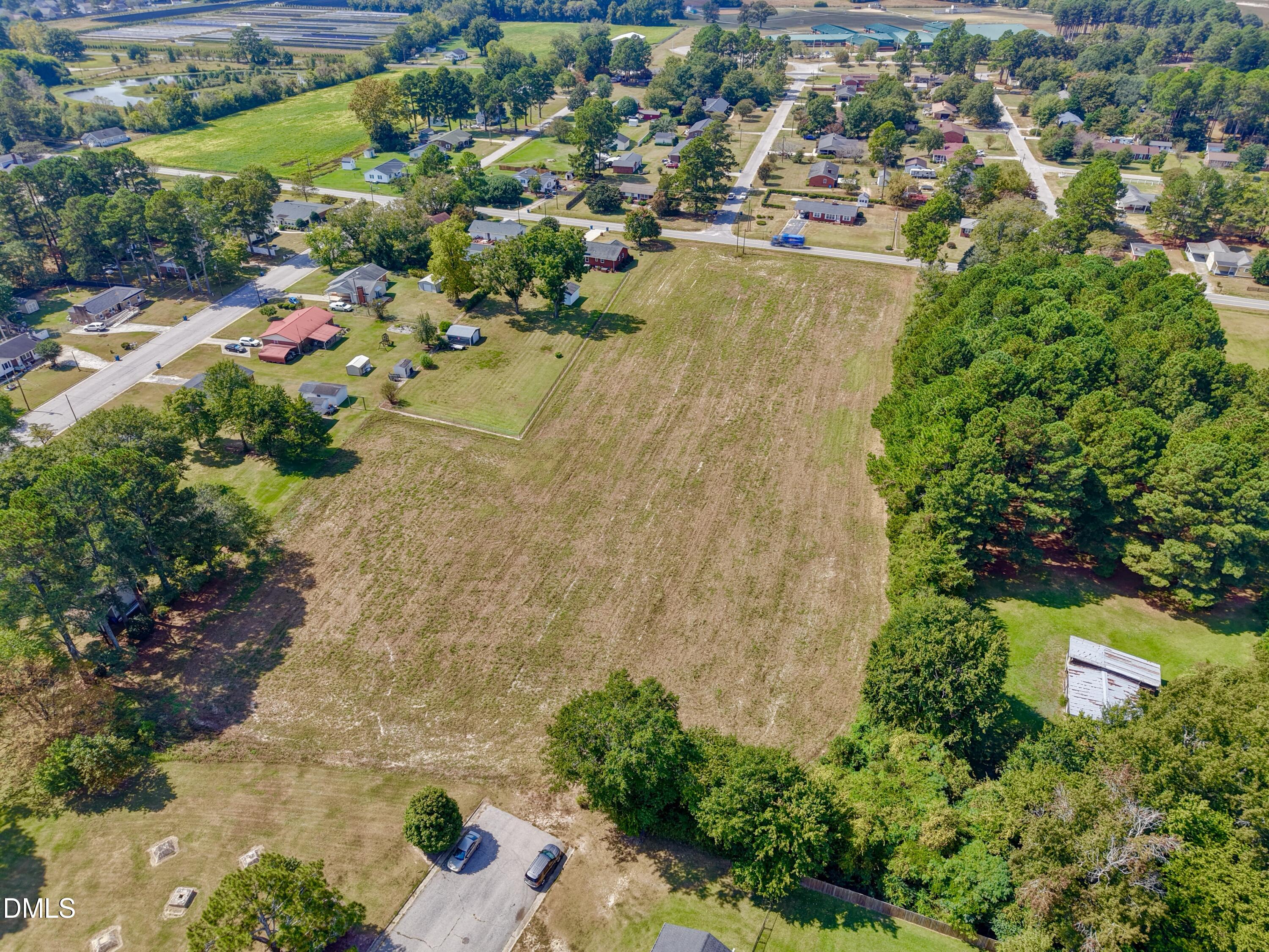 4.47-ac Fairground Road Dunn, NC 28334 - Photo 4 of 23 an aerial view of a houses with a yard