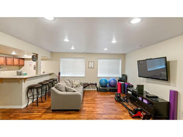 a kitchen with a table and chairs in it