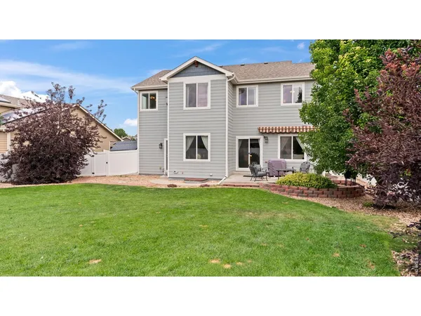 a picture of a house with a yard