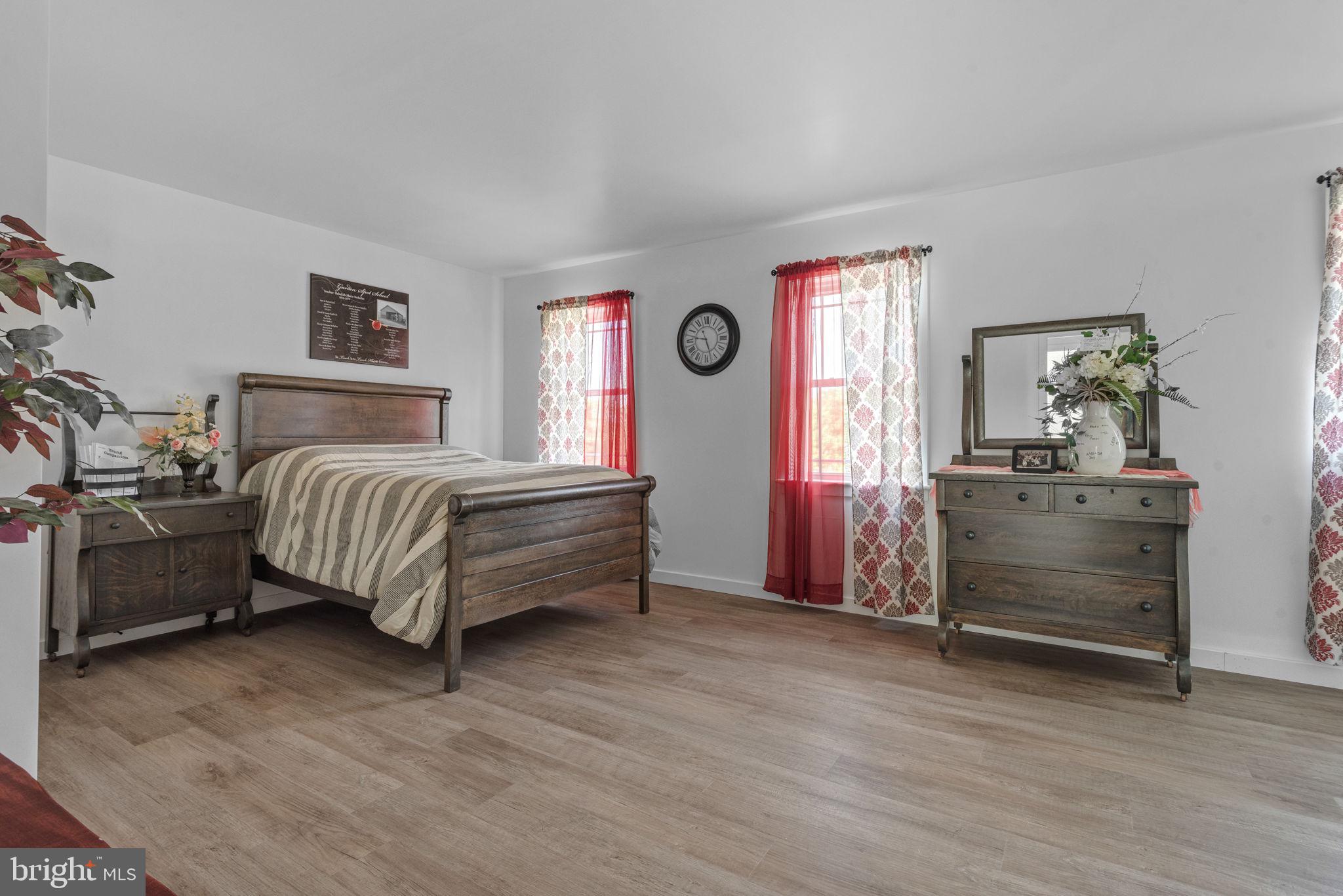 5382 Paes Road New Holland, PA 17557 - Photo 29 of 80 a bedroom with a bed and a dresser