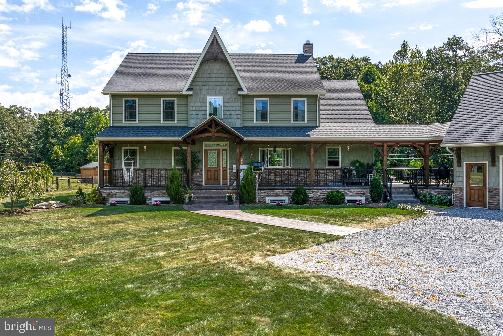 5382 Paes Road New Holland, PA 17557 - Photo 3 of 80 a front view of a house with a yard