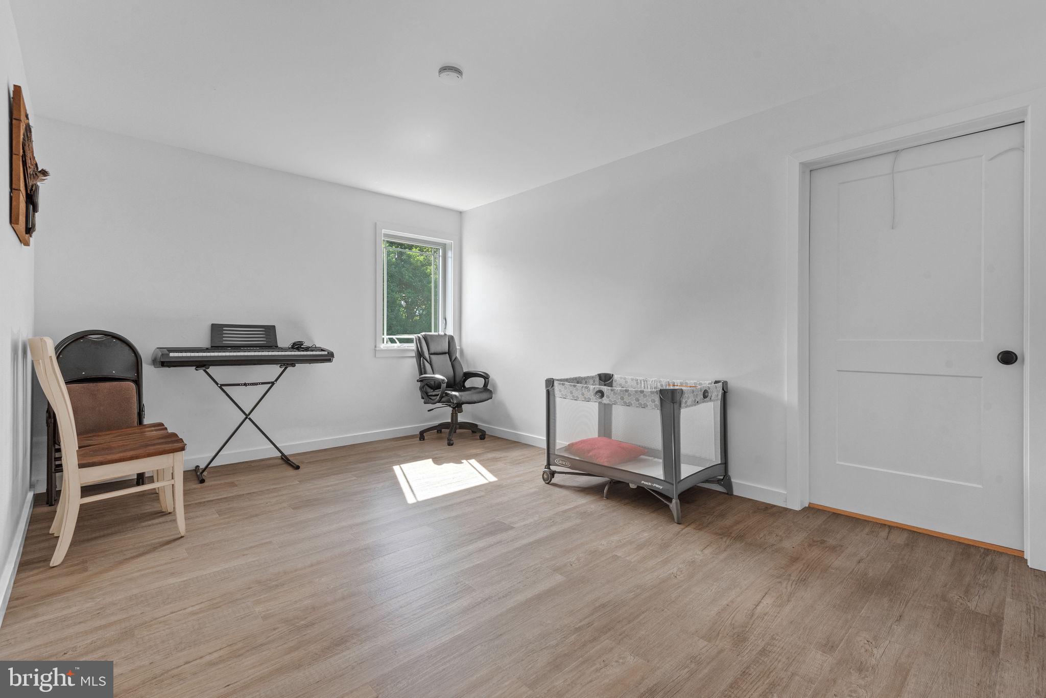 5382 Paes Road New Holland, PA 17557 - Photo 36 of 80 a view of a workspace with furniture and a chair