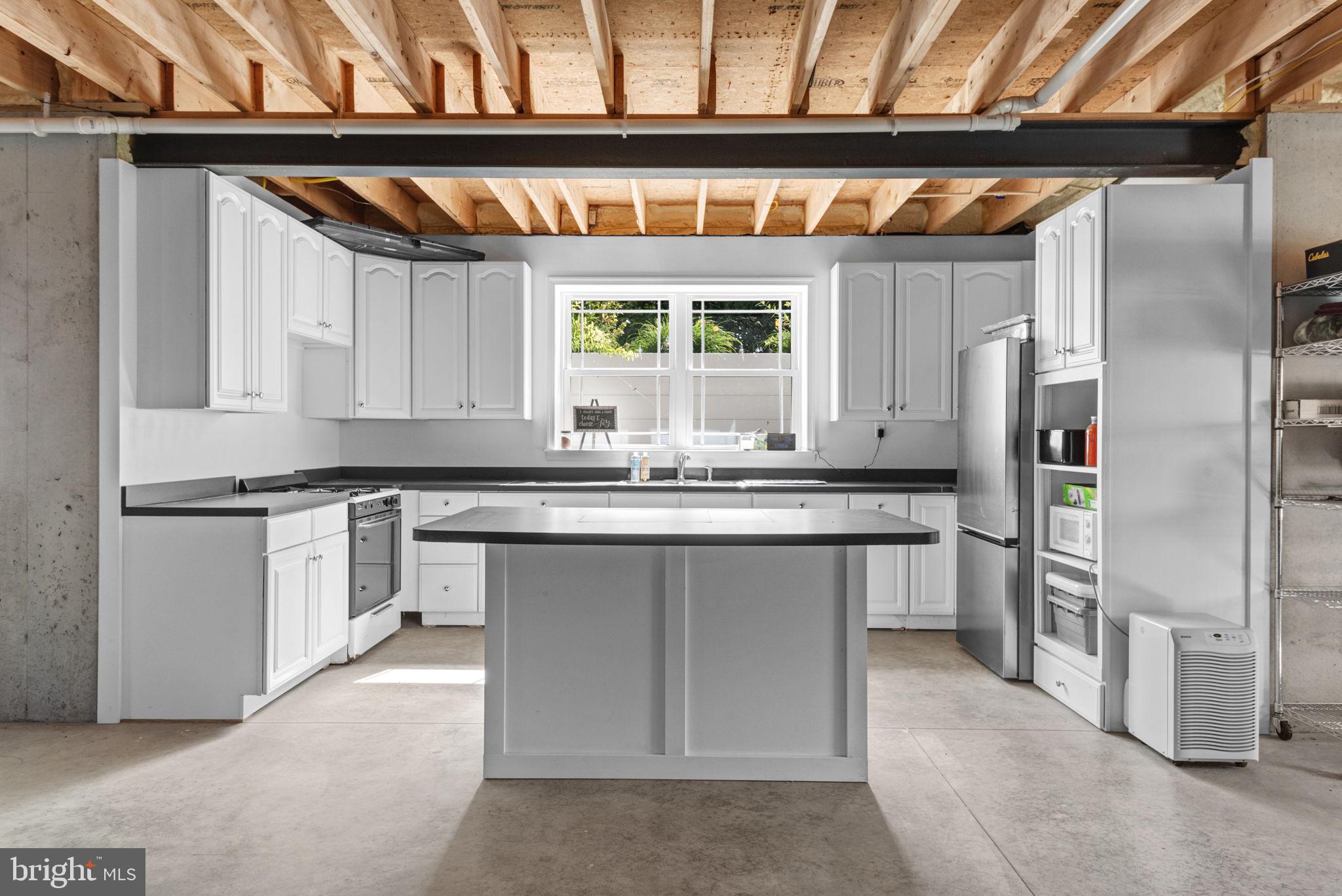 5382 Paes Road New Holland, PA 17557 - Photo 42 of 80 a kitchen with stainless steel appliances a sink and a refrigerator