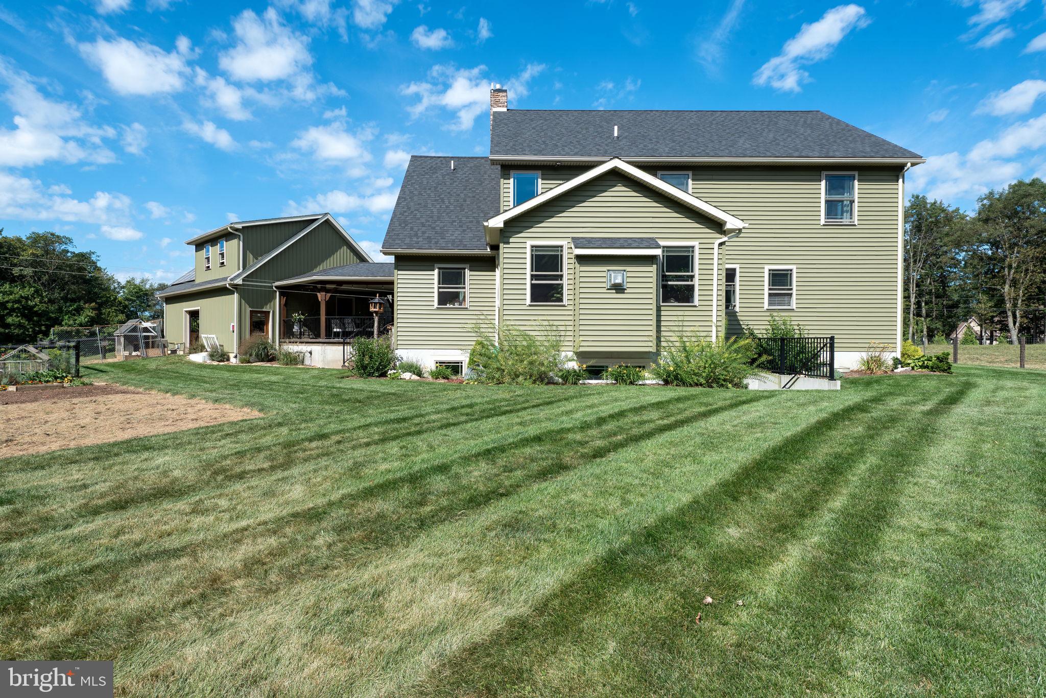 5382 Paes Road New Holland, PA 17557 - Photo 54 of 80 a front view of a house with garden