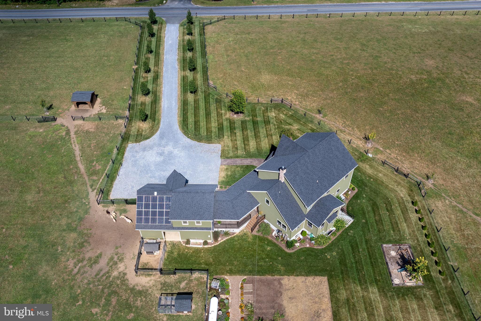 5382 Paes Road New Holland, PA 17557 - Photo 69 of 80 an aerial view of residential houses with outdoor space and swimming pool