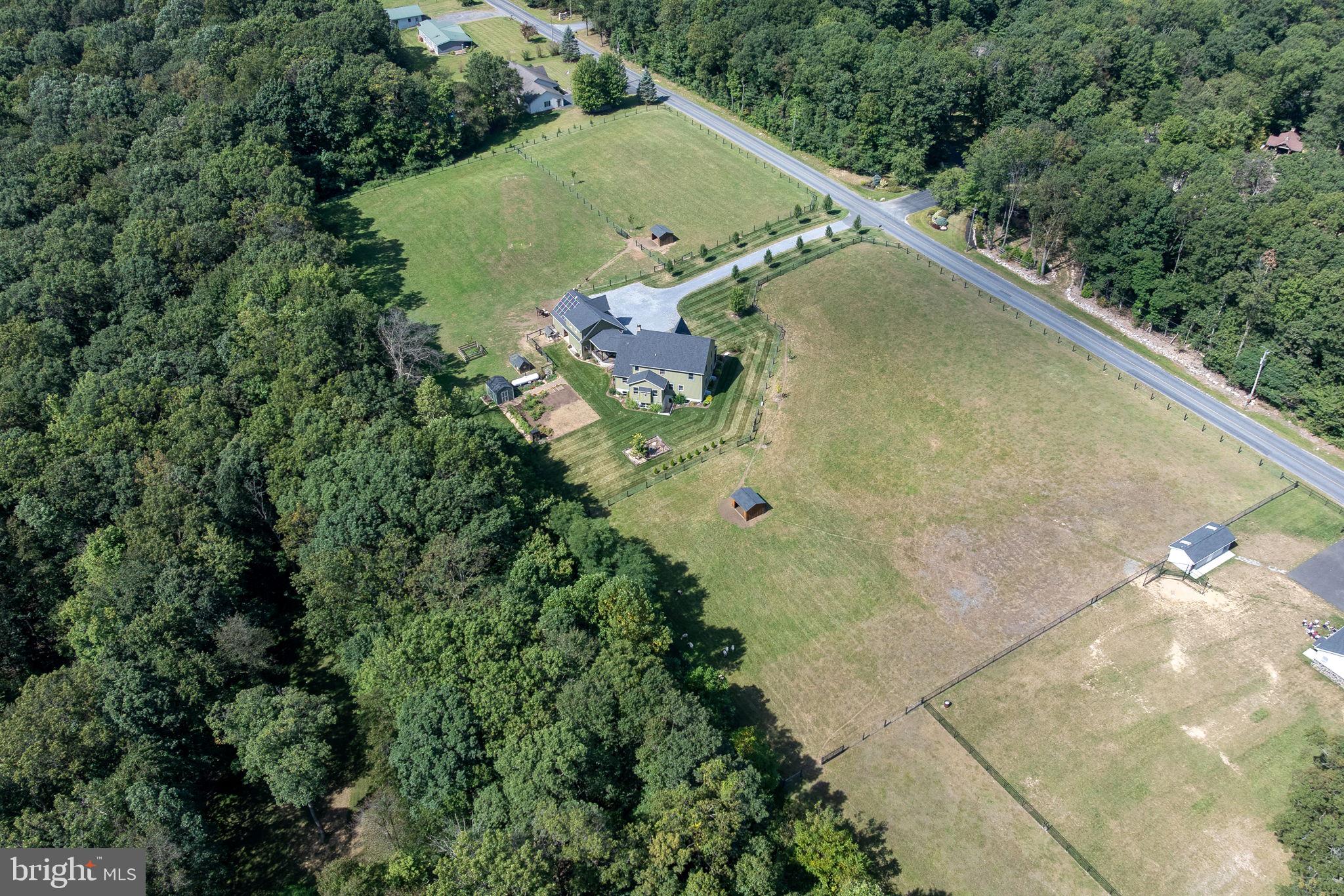 5382 Paes Road New Holland, PA 17557 - Photo 77 of 80 an aerial view of a house a yard and lake view