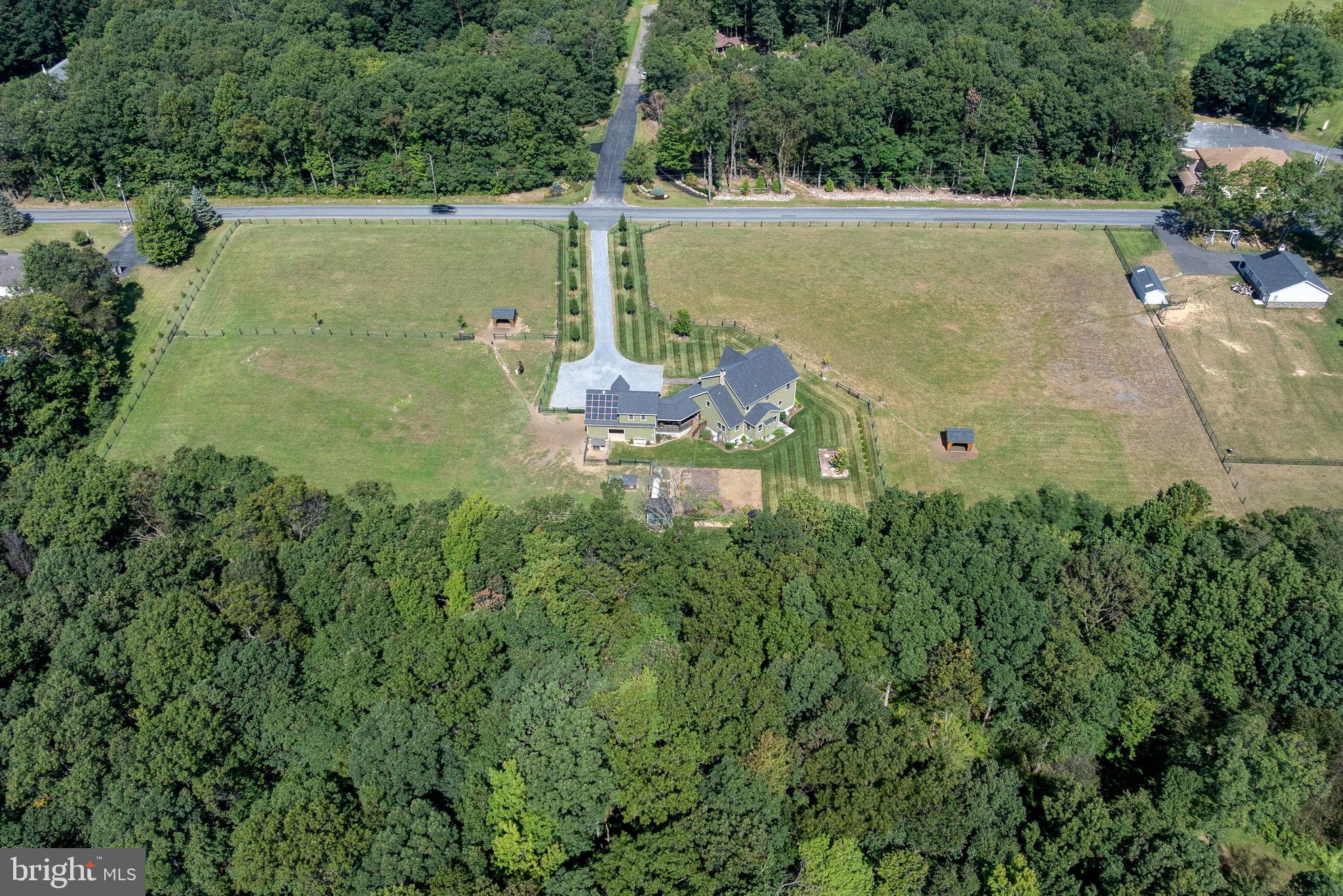 5382 Paes Road New Holland, PA 17557 - Photo 78 of 80 a view of a lake with a building in the back