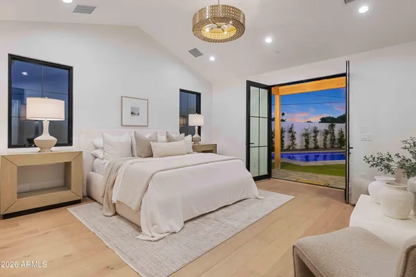 a bedroom with a bed and a view of bathroom