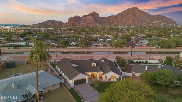 an aerial view of a house with a garden