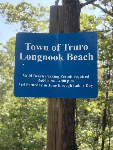 a sign broad in front of a building