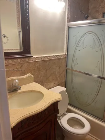 a bathroom with a sink and a toilet