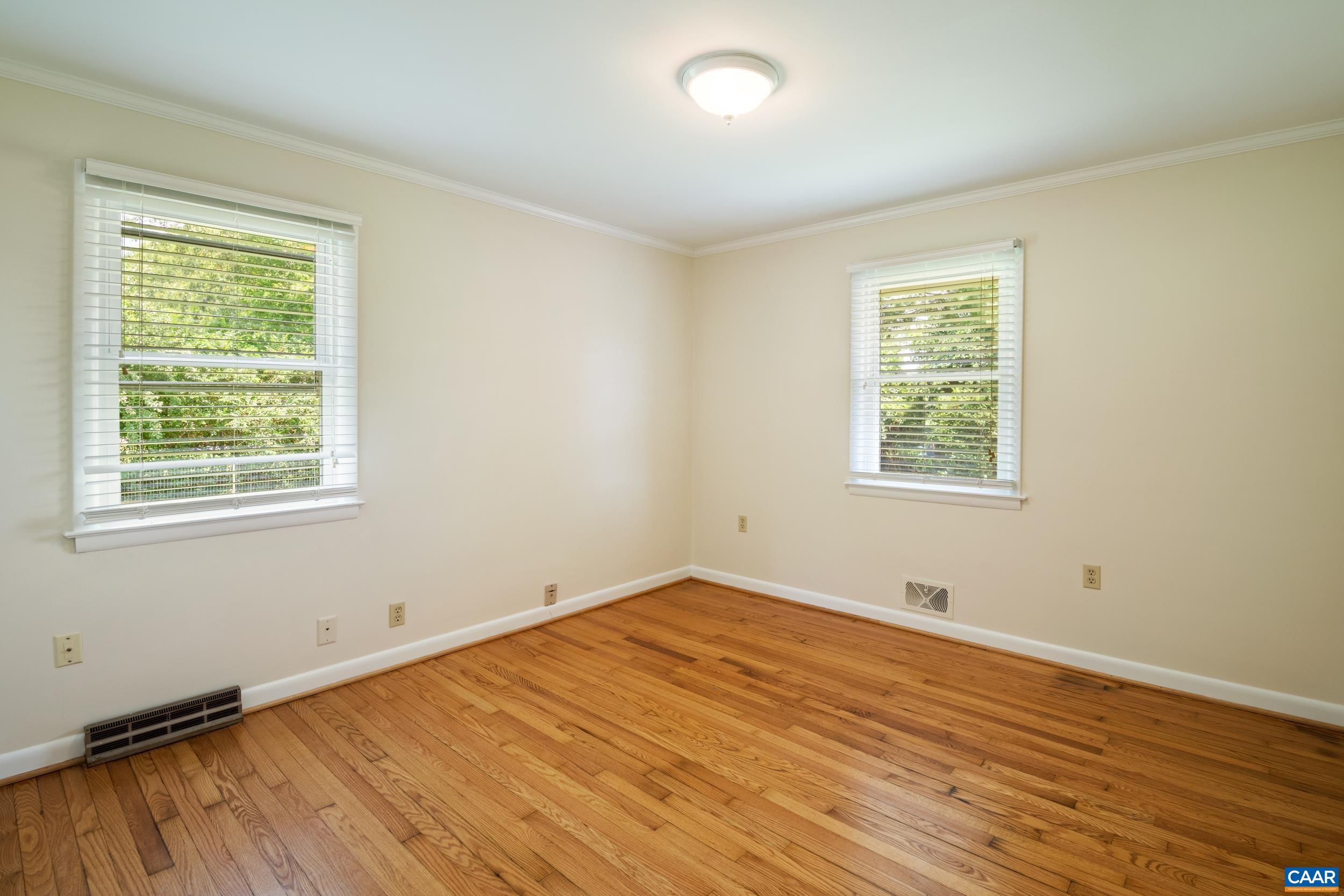 1293 Reas Ford Road Earlysville, VA 22936 - Photo 23 of 38 a view of a room with wooden floor and windows