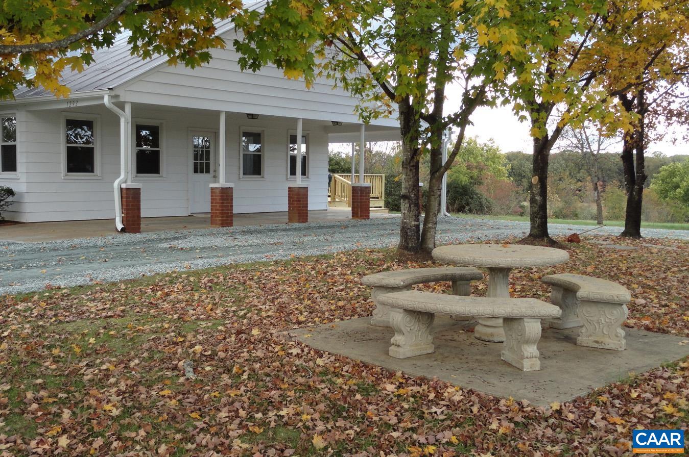 1293 Reas Ford Road Earlysville, VA 22936 - Photo 34 of 38 a view of a house with backyard and sitting area