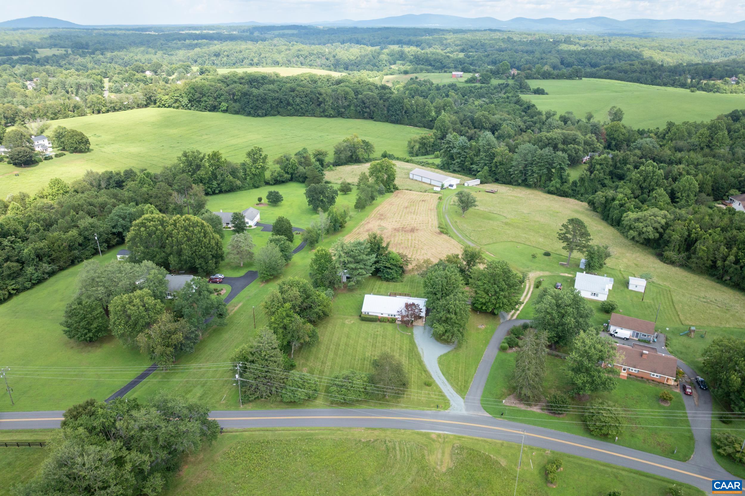 1293 Reas Ford Road Earlysville, VA 22936 - Photo 38 of 38 an aerial view of residential houses with outdoor space and trees