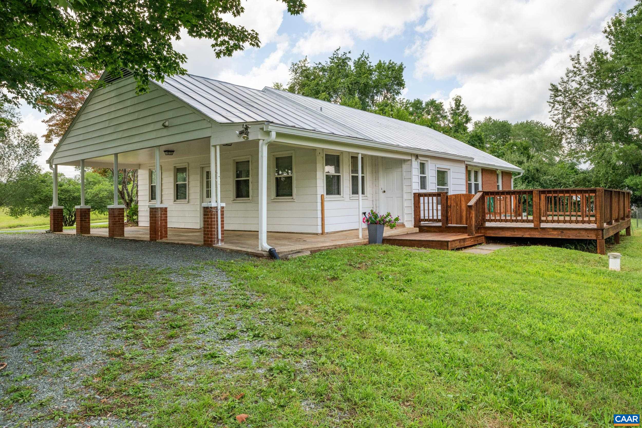 1293 Reas Ford Road Earlysville, VA 22936 - Photo 7 of 38 a view of a house with backyard and porch