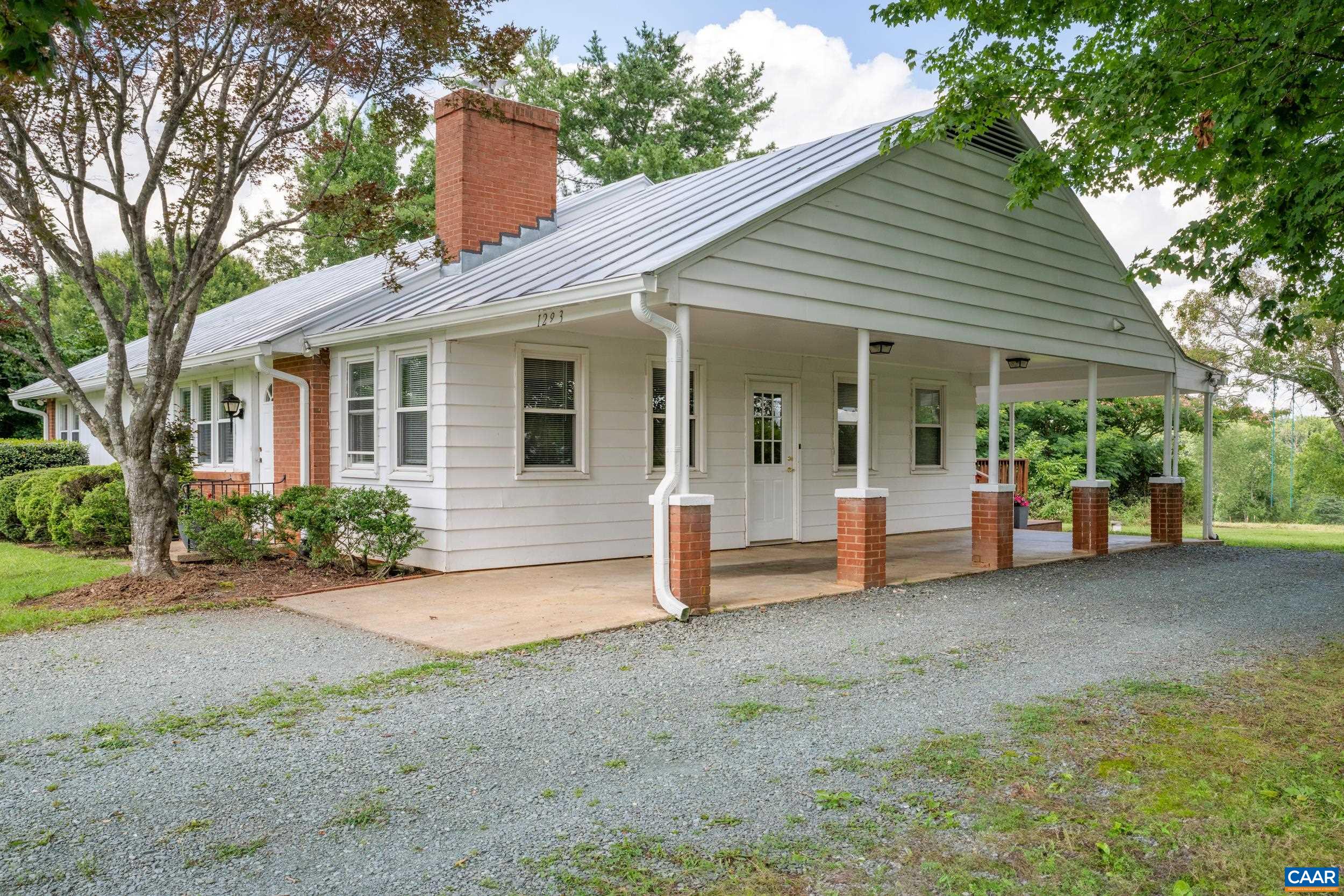 1293 Reas Ford Road Earlysville, VA 22936 - Photo 8 of 38 a view of a house with porch and garden
