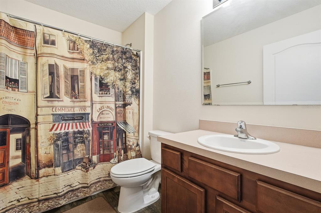 123 Fairway Court Bunnell, FL 32110 - Photo 15 of 22 a bathroom with a sink a toilet and shower