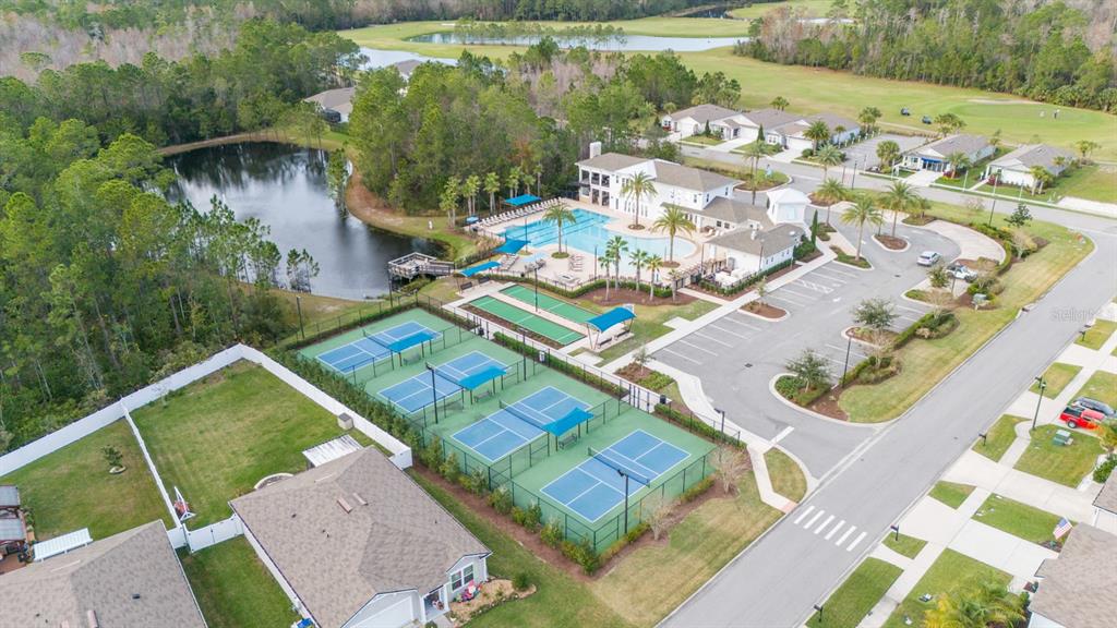 123 Fairway Court Bunnell, FL 32110 - Photo 17 of 22 an aerial view of a house with a garden