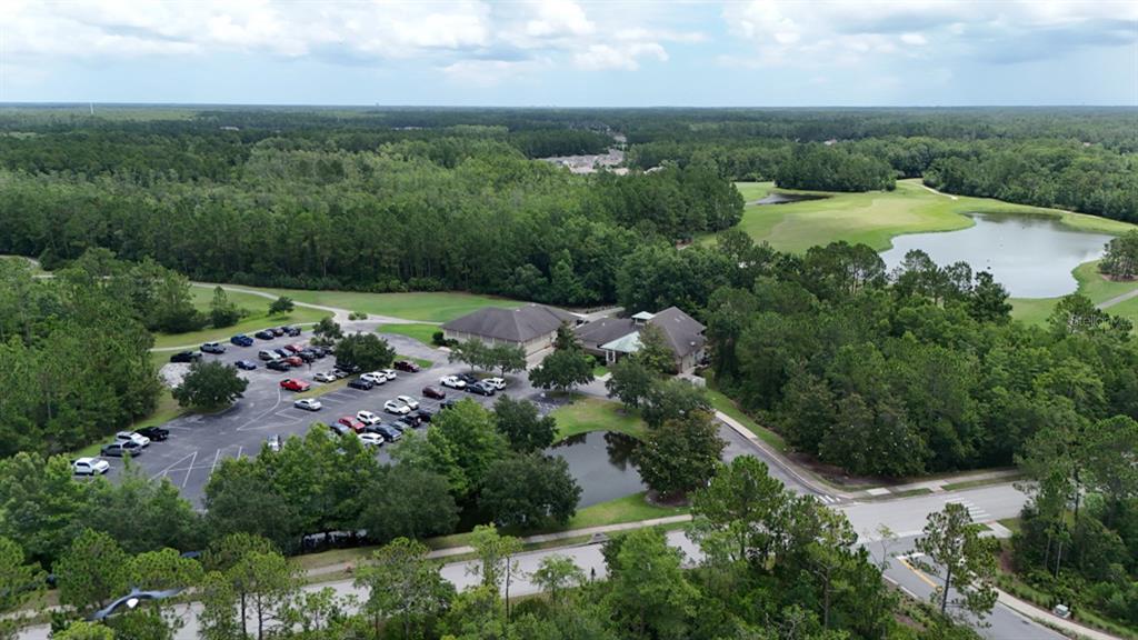 123 Fairway Court Bunnell, FL 32110 - Photo 18 of 22 an aerial view of a city and mountain view in back