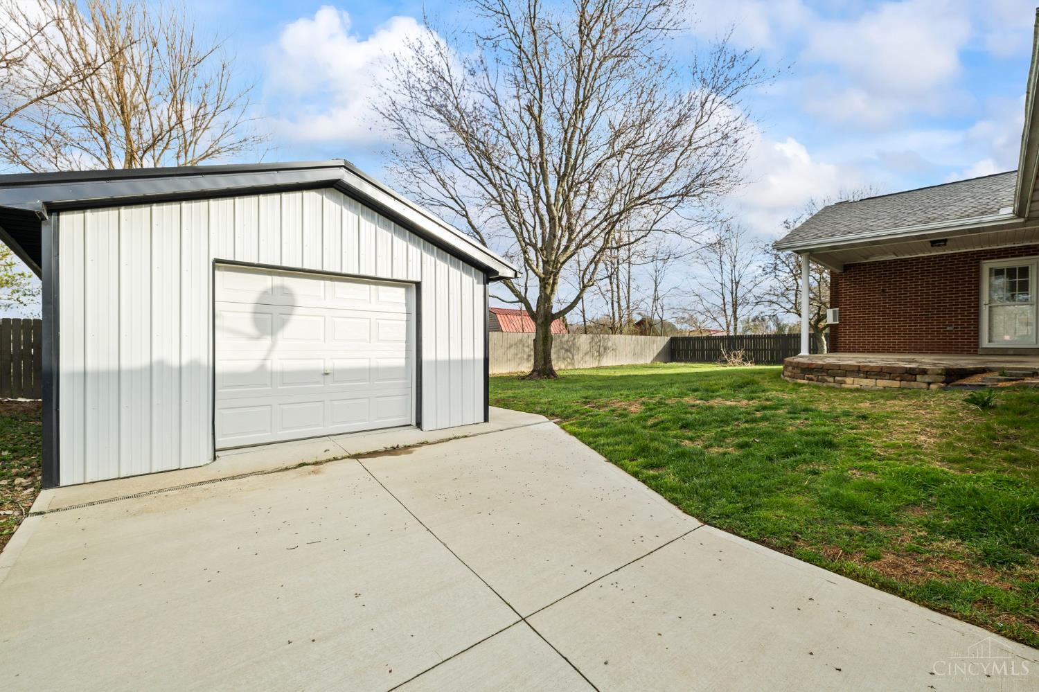 7306 Fairground Road Blanchester, OH 45107 - Photo 32 of 41 Two year old building with garage door, service door, full electric, and poured concrete floor.