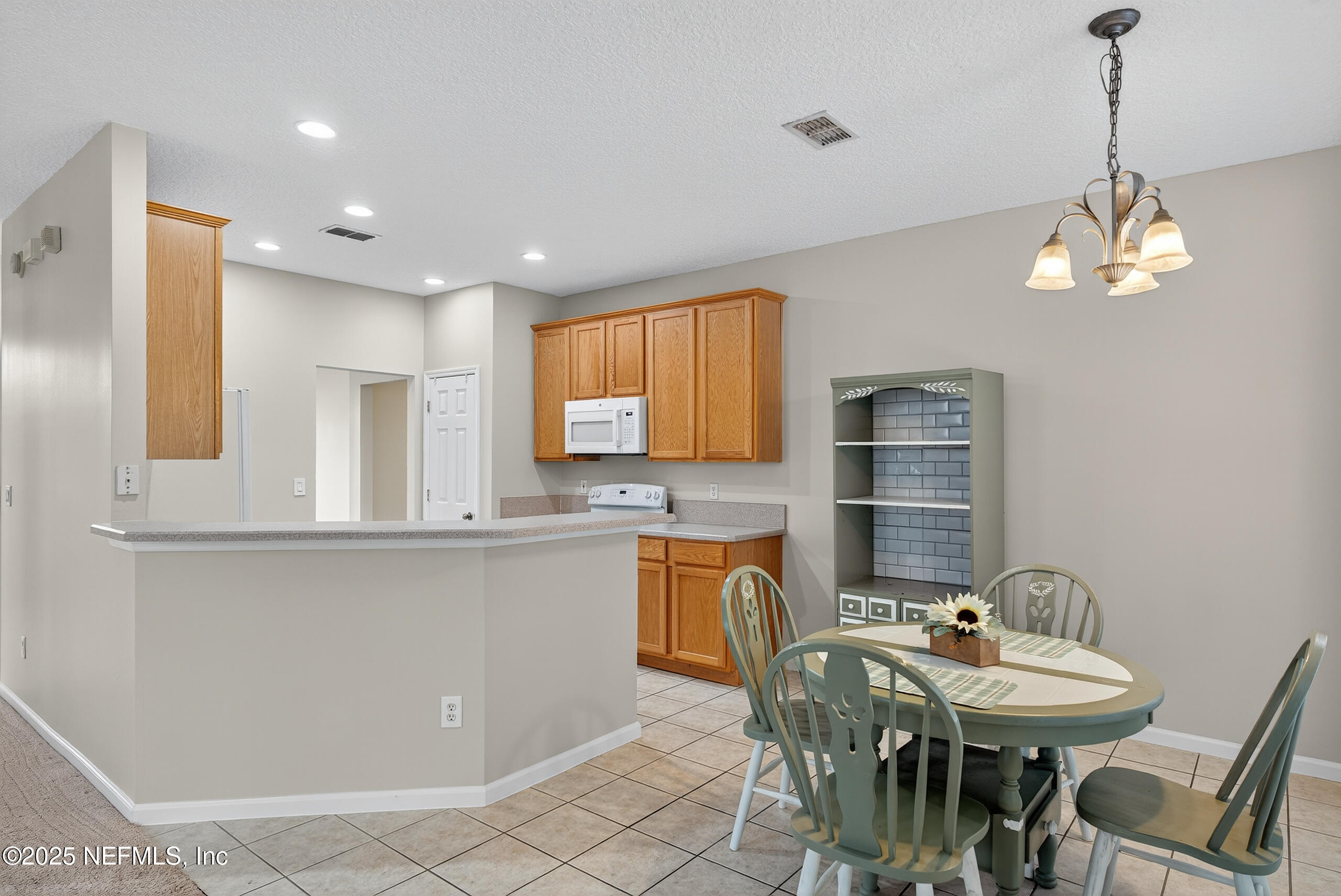1908 Tuscan Oaks Court Fleming Island, FL 32003 - Photo 14 of 33 Dining Area A1