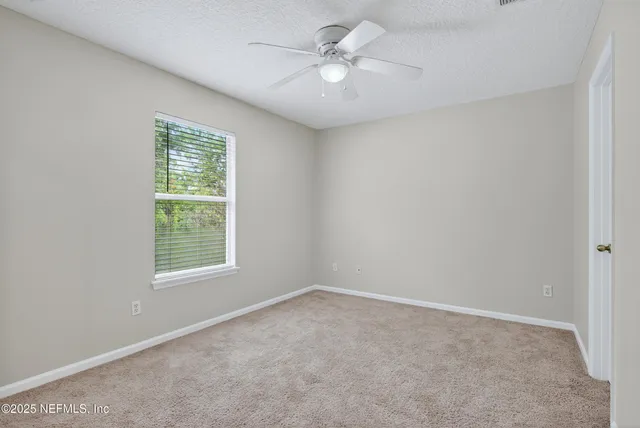 an aerial view of a house having swimming pool garden and patio
