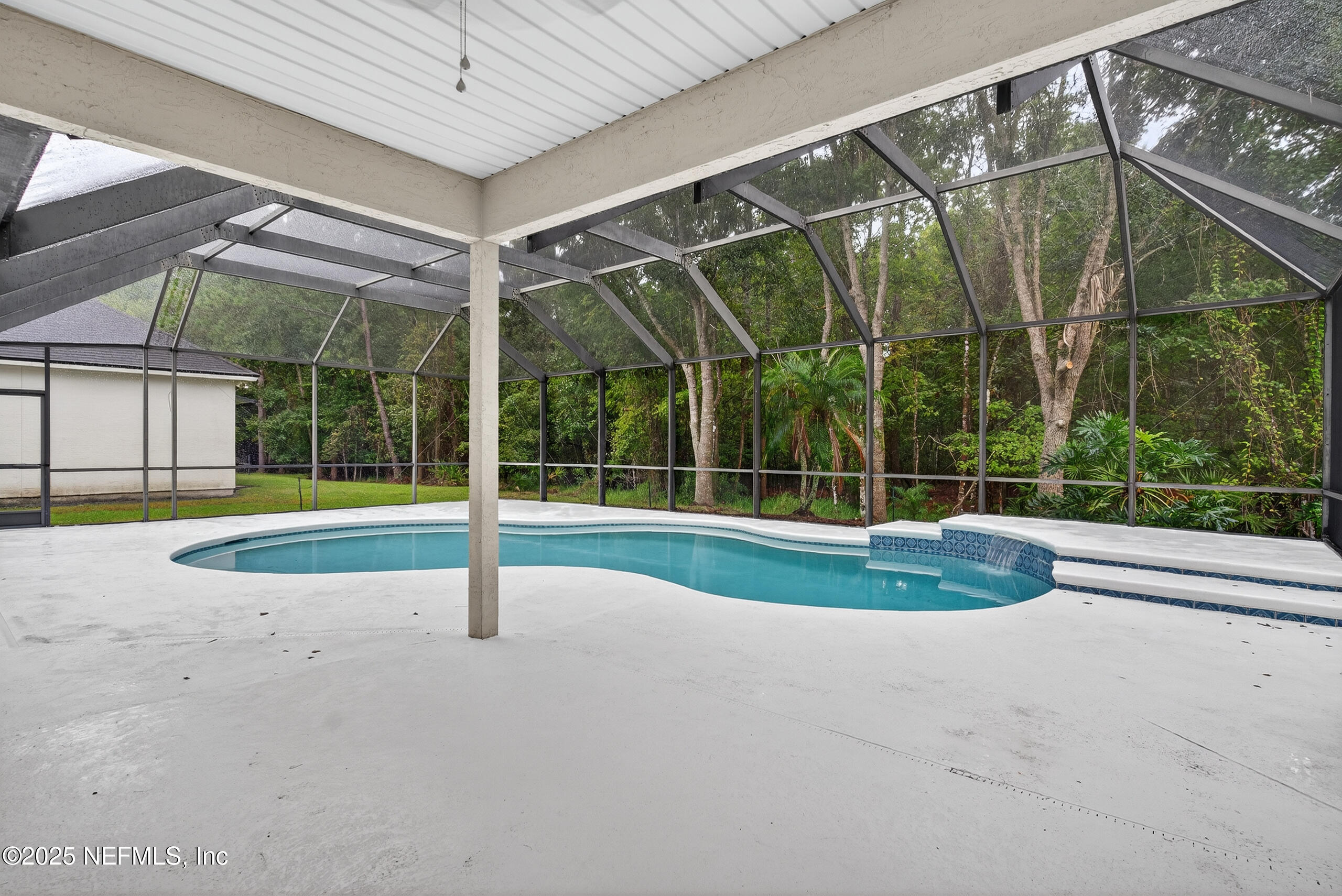 1908 Tuscan Oaks Court Fleming Island, FL 32003 - Photo 3 of 33 a view of a house with a small yard