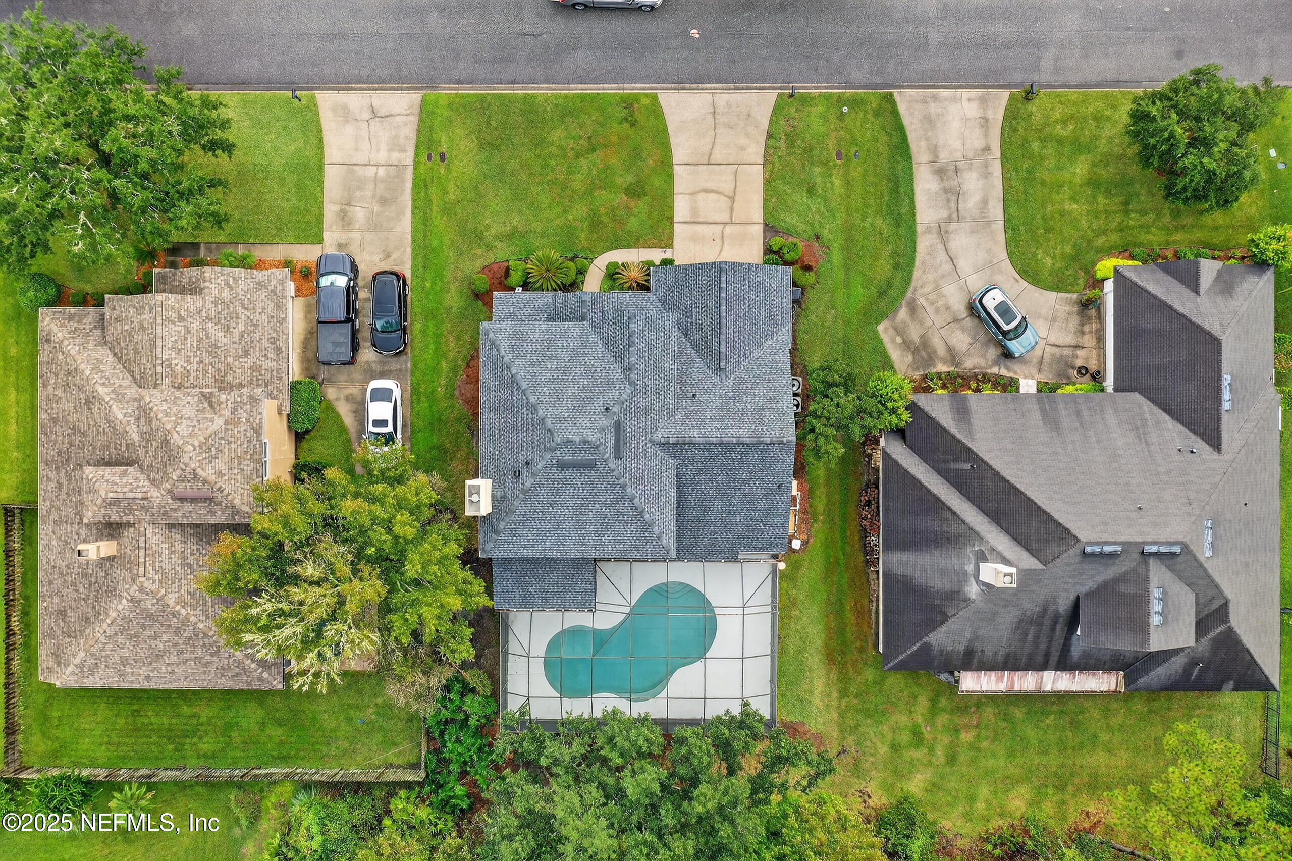 1908 Tuscan Oaks Court Fleming Island, FL 32003 - Photo 33 of 33 an aerial view of a house with garden space and outdoor seating