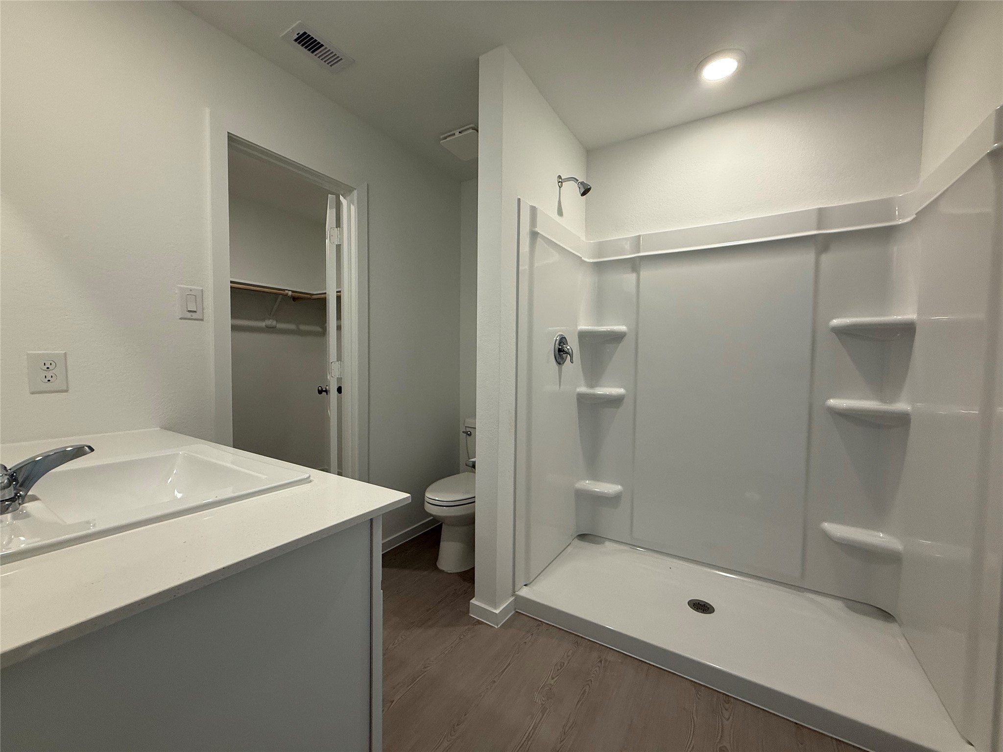 12915 Shells Lane Crosby, TX 77532 - Photo 12 of 20 a bathroom with a sink a toilet and shower