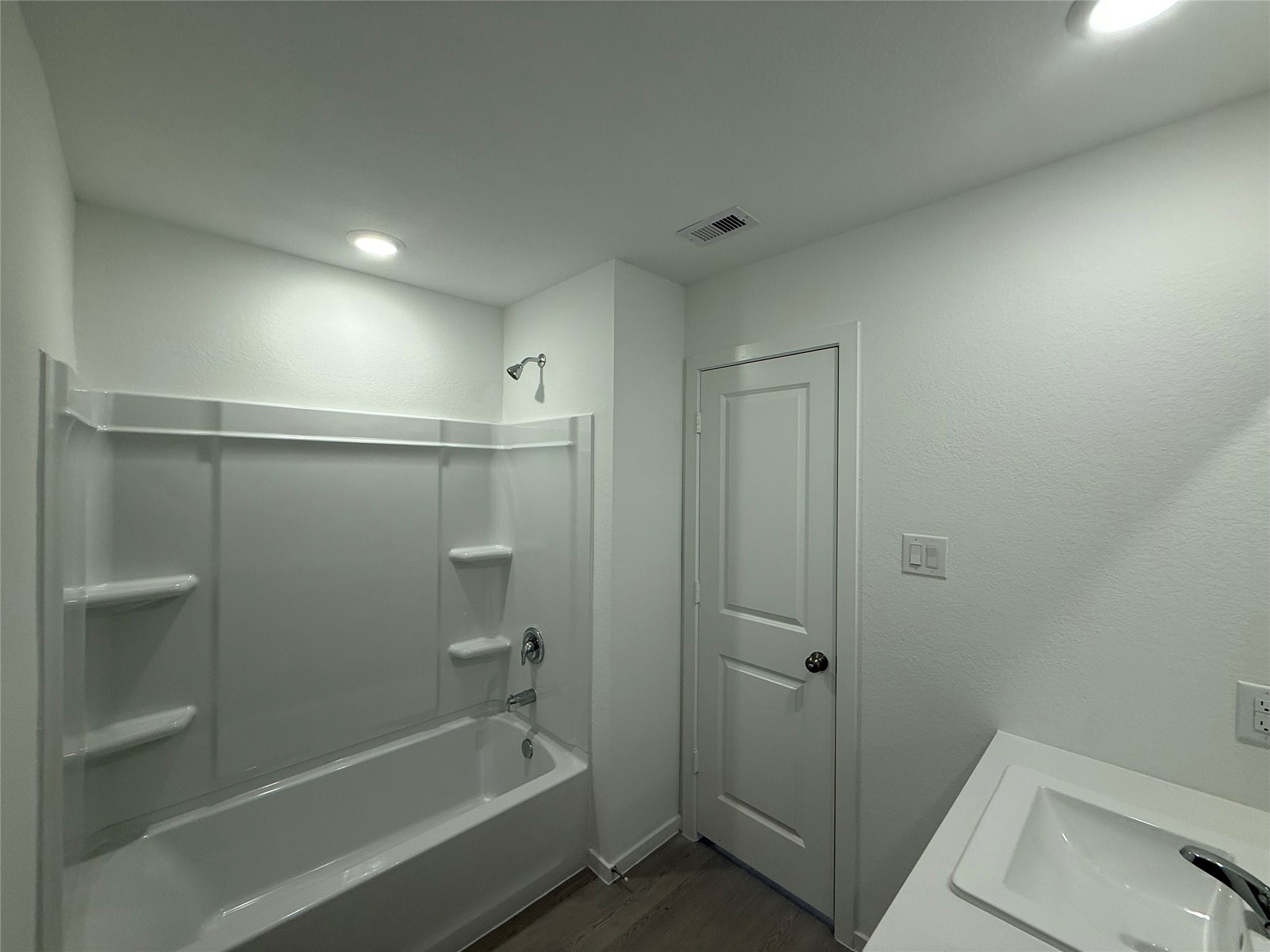 12915 Shells Lane Crosby, TX 77532 - Photo 13 of 20 a bathroom with a tub and shower