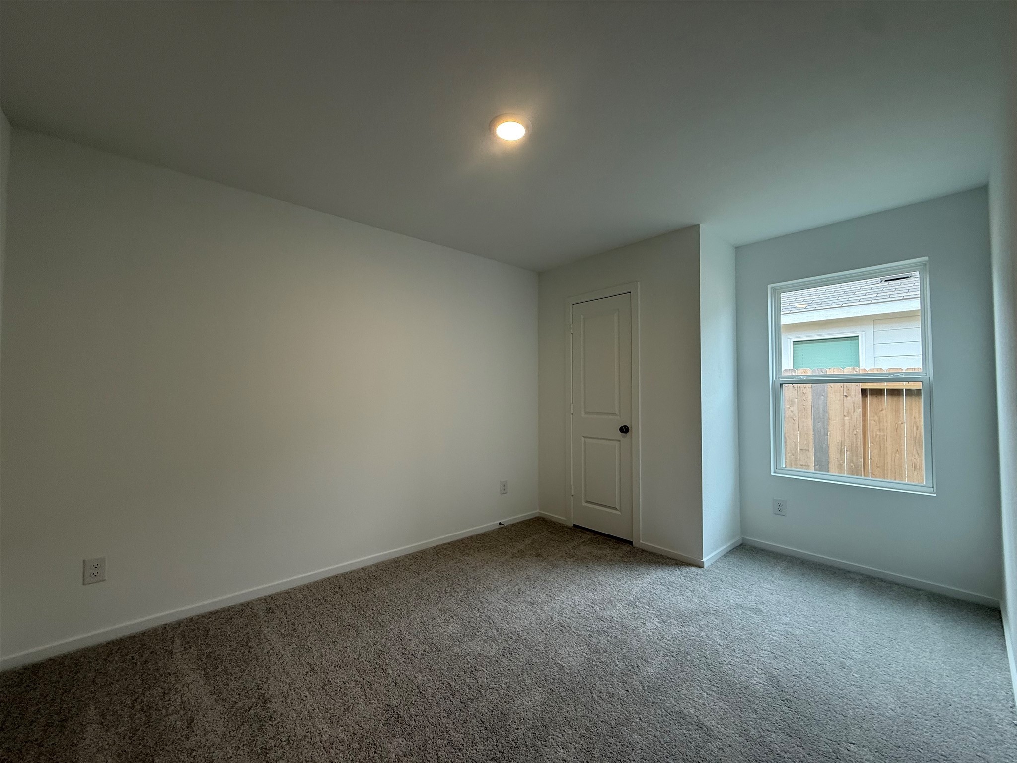 12915 Shells Lane Crosby, TX 77532 - Photo 16 of 20 an empty room with a window