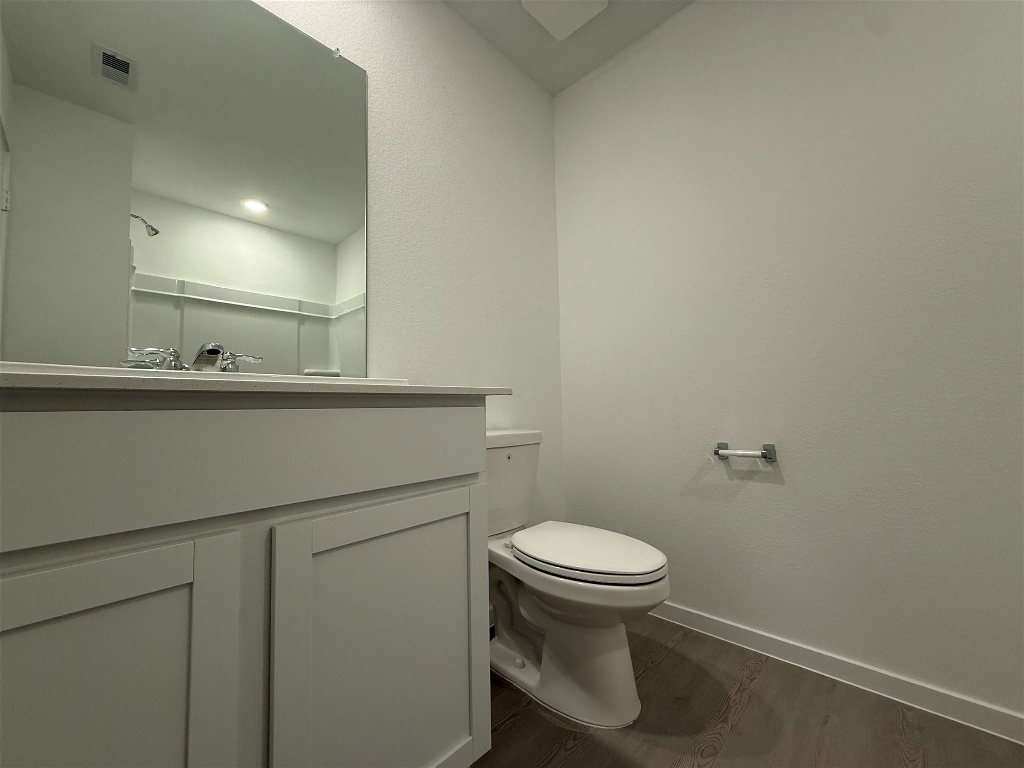 12915 Shells Lane Crosby, TX 77532 - Photo 18 of 20 a bathroom with a sink a toilet and mirror