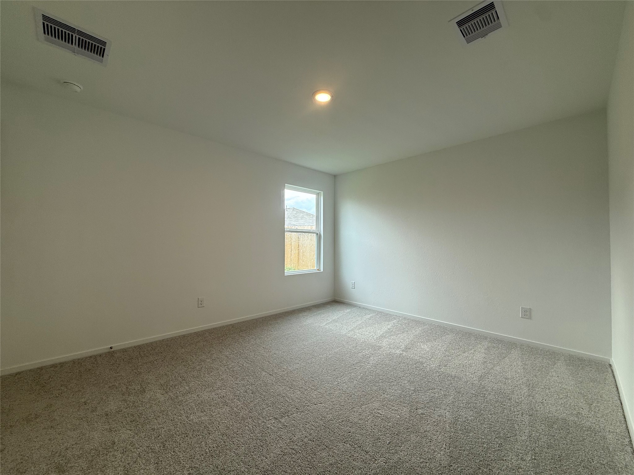 12915 Shells Lane Crosby, TX 77532 - Photo 10 of 20 an empty room with windows