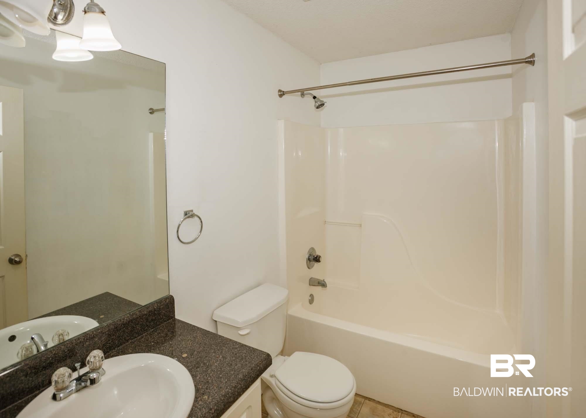 2530 Ashburn Lane Foley, AL 36535 - Photo 36 of 46 Full bathroom with bathtub / shower combination, vanity, toilet, and tile patterned flooring