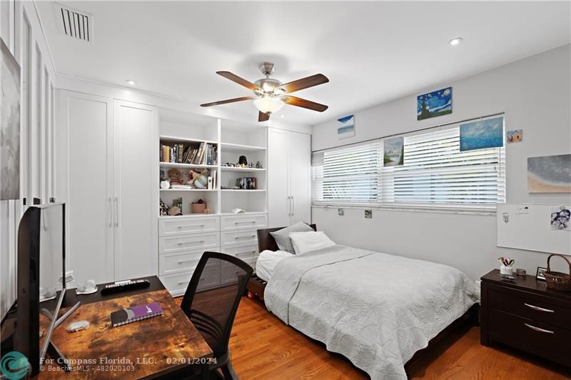 1129 Southwest 2nd Street Boca Raton, FL 33486 - Photo 17 of 39 a bedroom with a bed furniture and a window