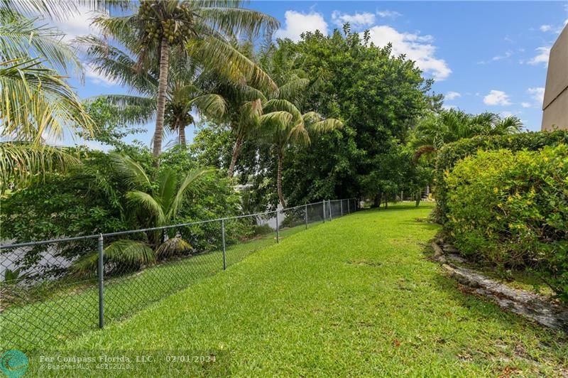 1129 Southwest 2nd Street Boca Raton, FL 33486 - Photo 26 of 39 a view of a backyard