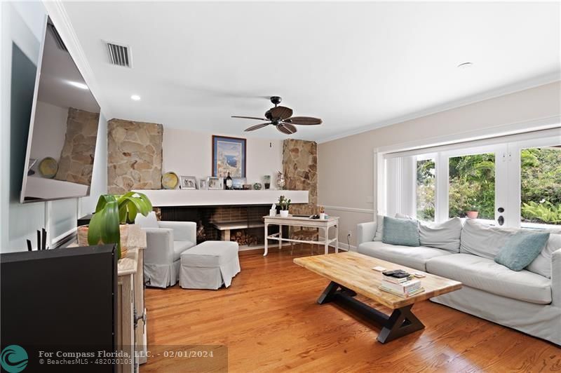 1129 Southwest 2nd Street Boca Raton, FL 33486 - Photo 7 of 39 a living room with furniture and a large window