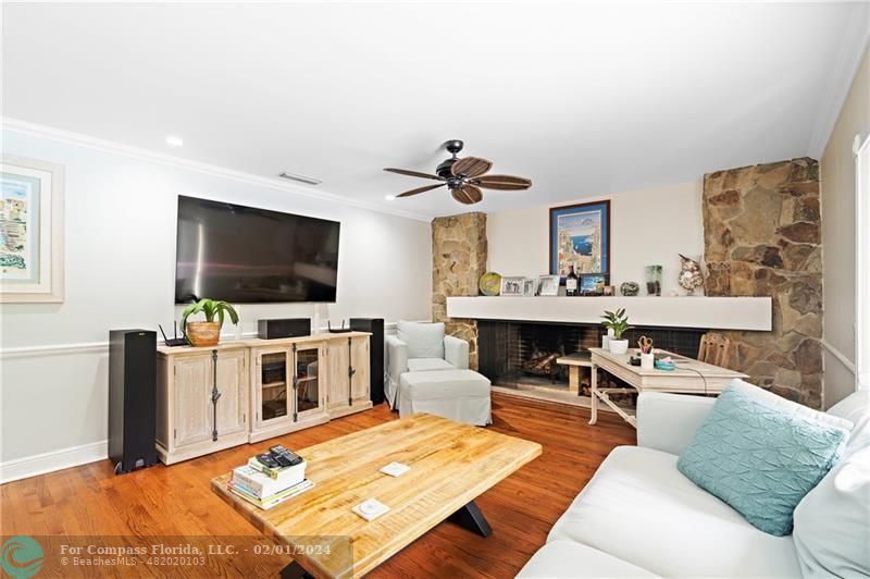 1129 Southwest 2nd Street Boca Raton, FL 33486 - Photo 8 of 39 a living room with furniture and a flat screen tv