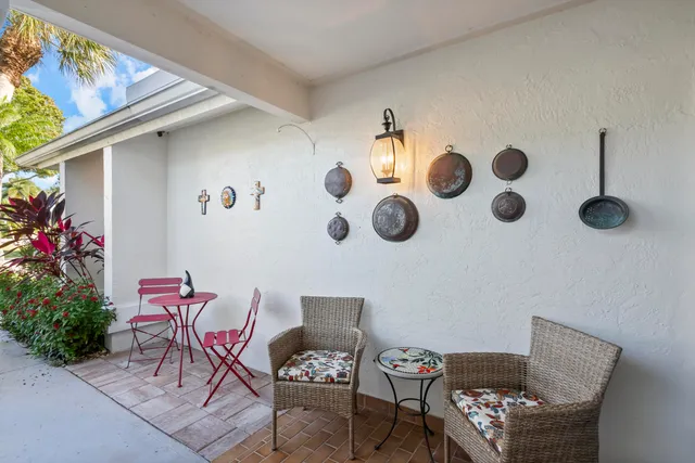 a view of a livingroom with furniture and windows