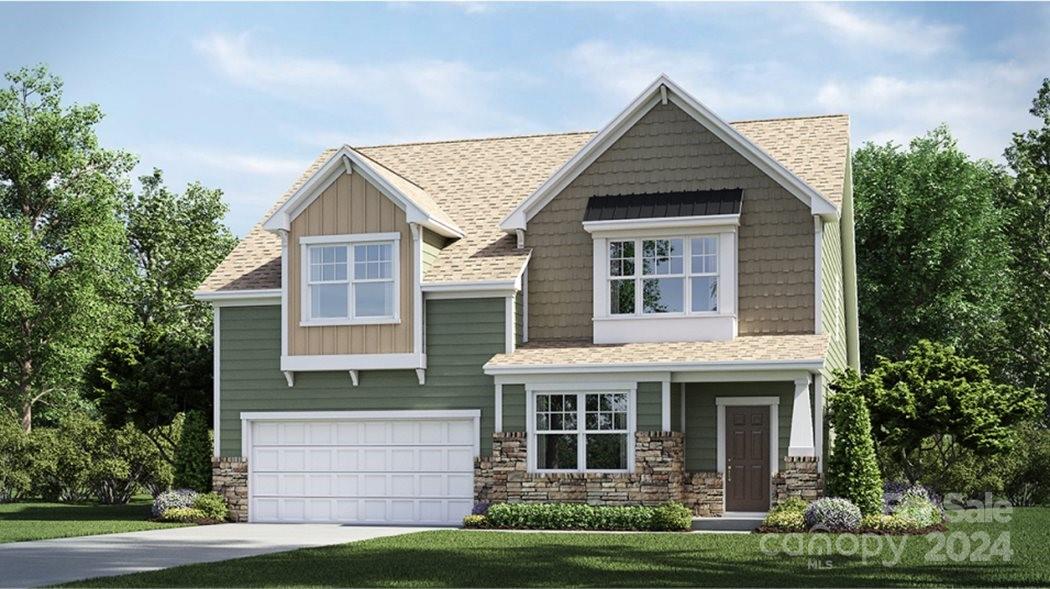 5681 Soft Shell Drive, Unit 370 Lancaster, SC 29720 - Photo 1 of 22 a front view of a house with a garden and plants