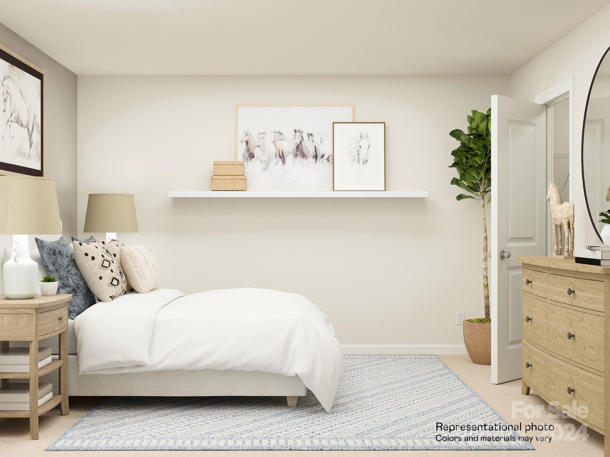 5681 Soft Shell Drive, Unit 370 Lancaster, SC 29720 - Photo 8 of 22 a bedroom with a bed and a dresser