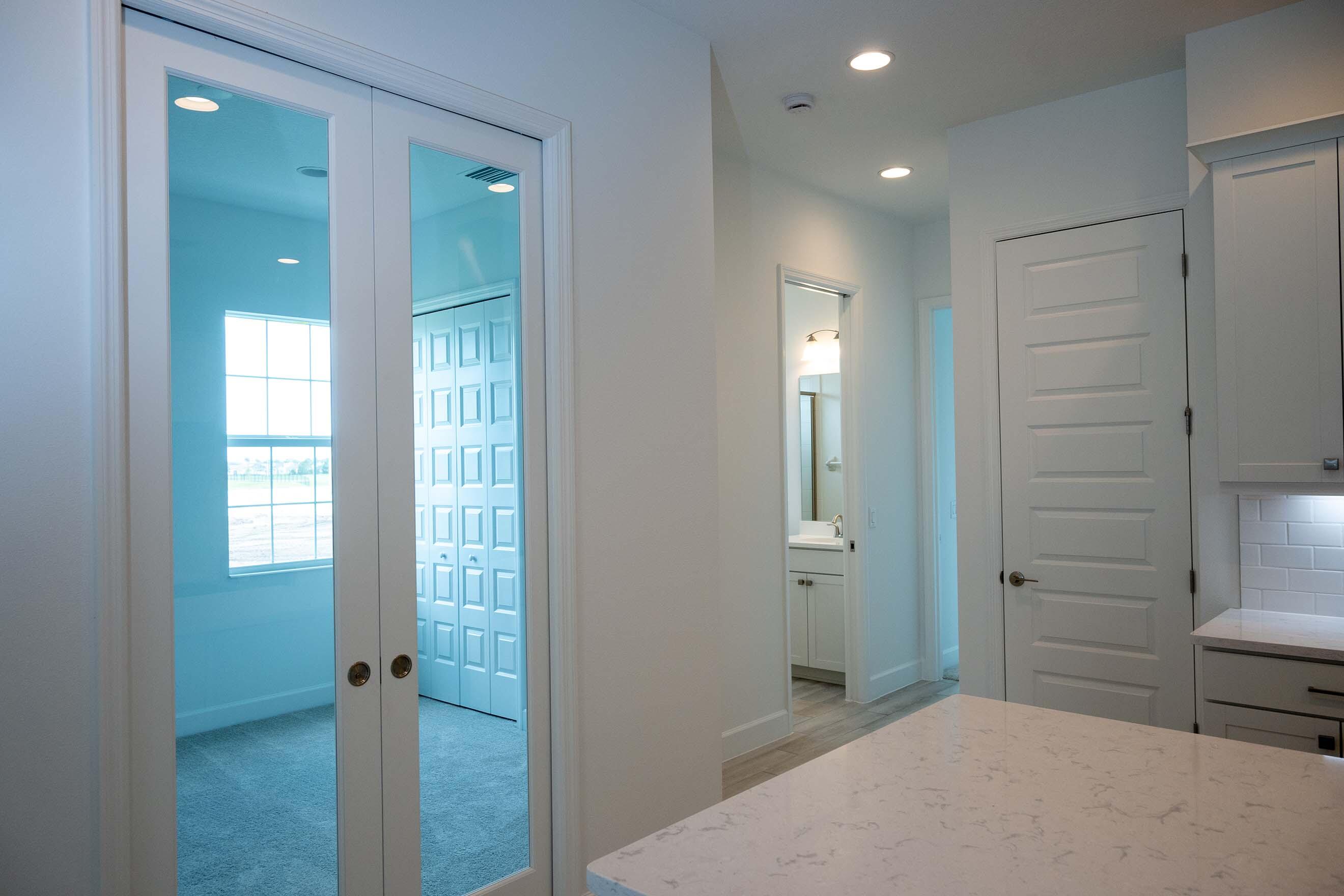 7809 Cache Crk Lane Melbourne, FL 32940 - Photo 15 of 35 wooden floor and closet in a en suite bathroom