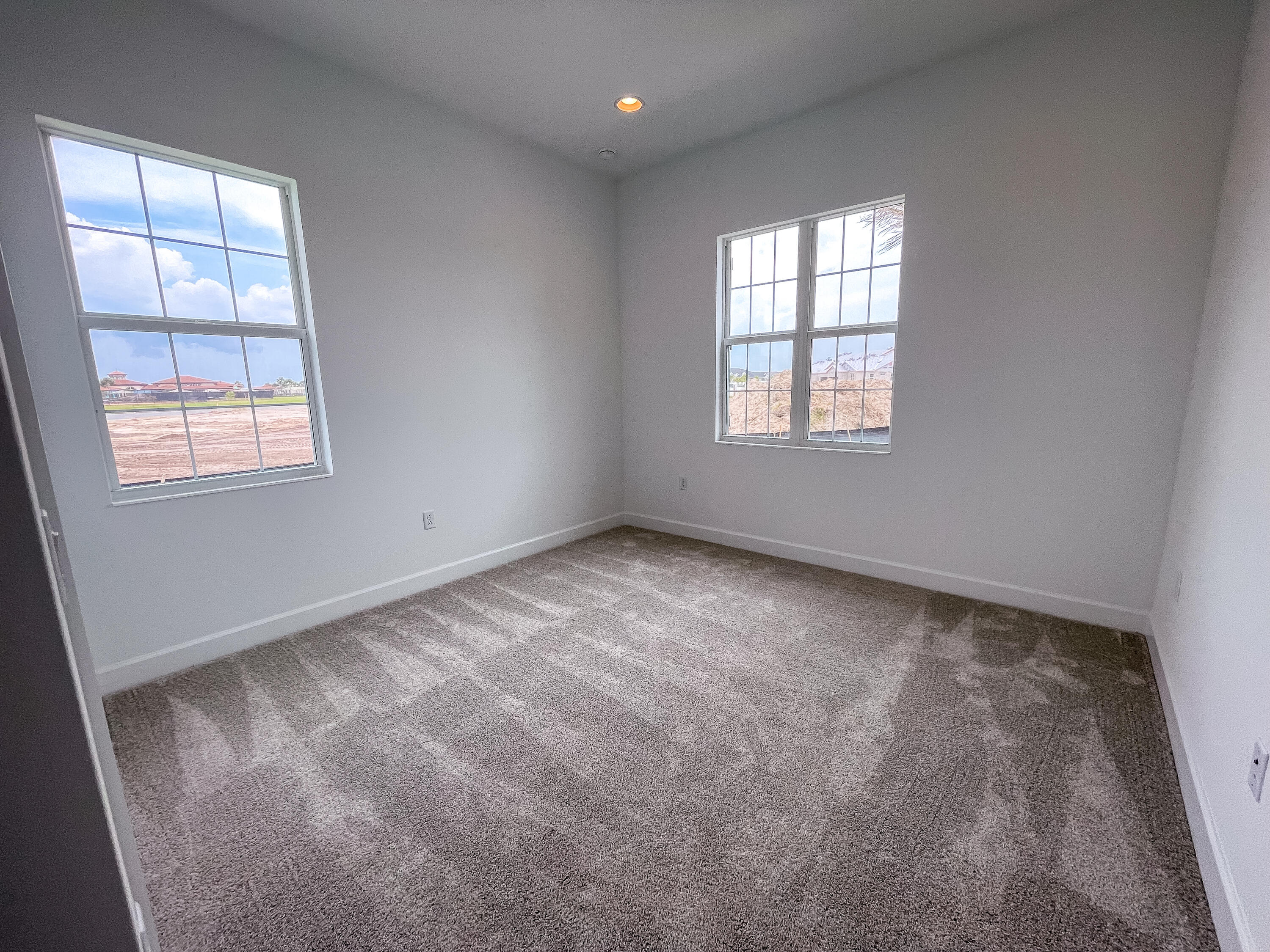 7809 Cache Crk Lane Melbourne, FL 32940 - Photo 20 of 35 an empty room with a window