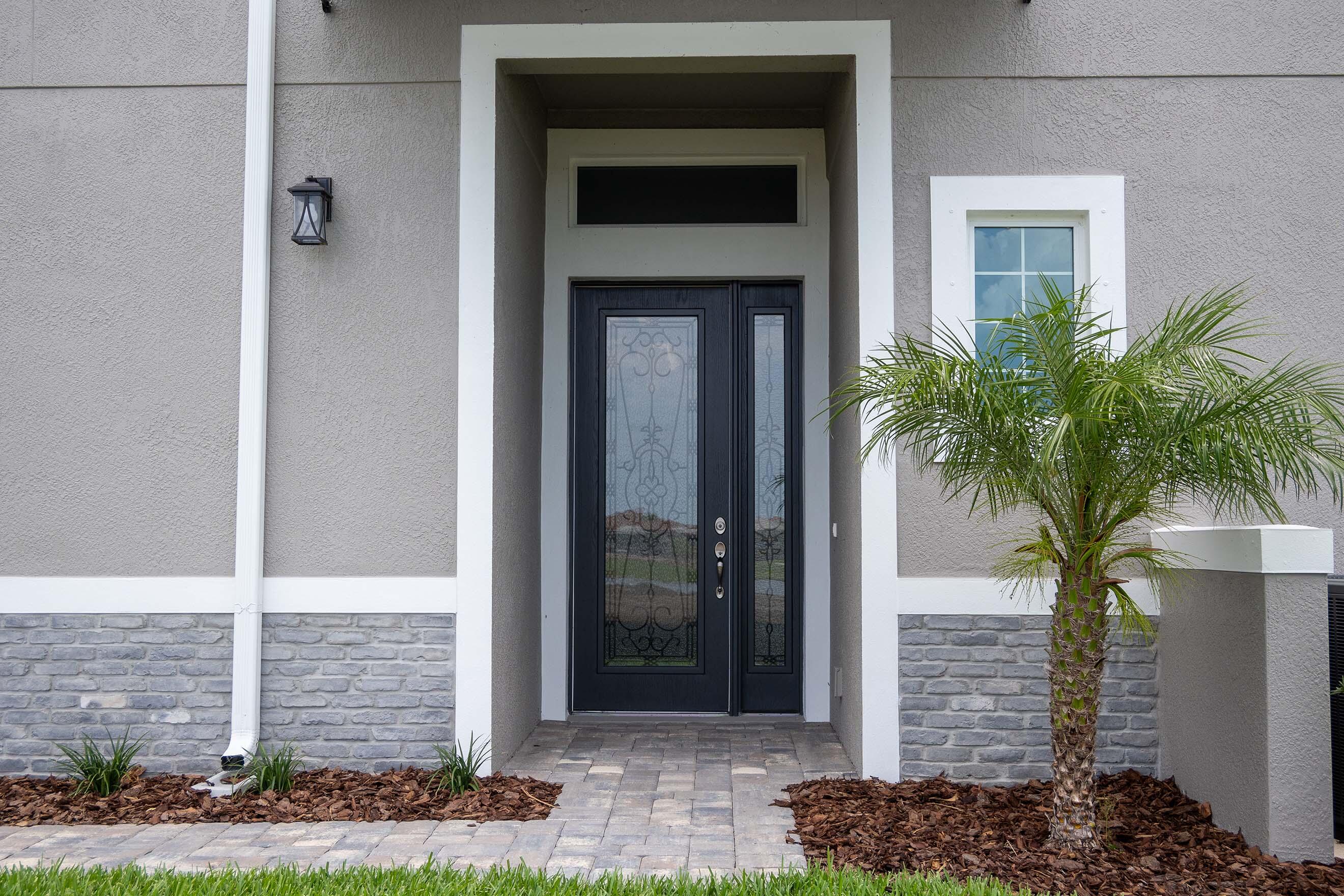 7809 Cache Crk Lane Melbourne, FL 32940 - Photo 29 of 35 a front view of a house with a yard