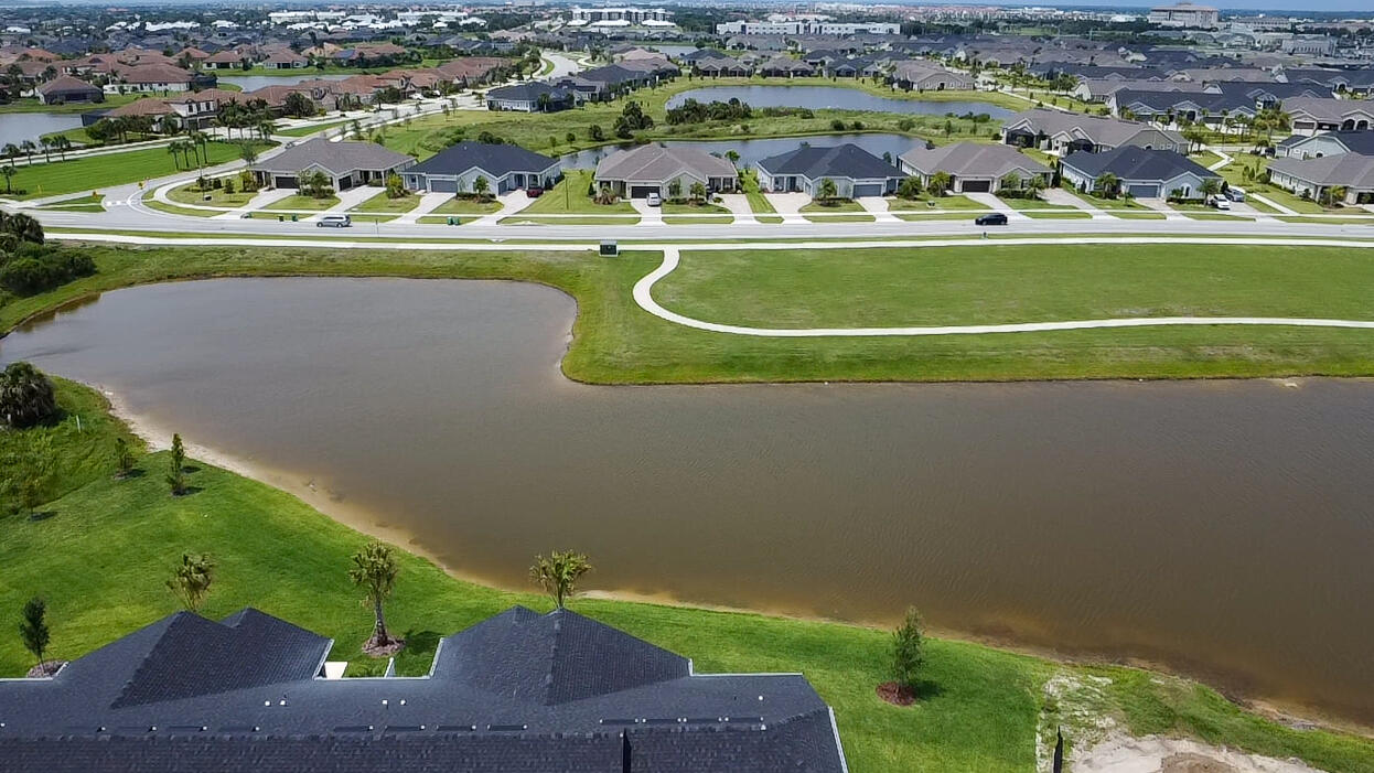 7809 Cache Crk Lane Melbourne, FL 32940 - Photo 32 of 35 an aerial view of a football ground