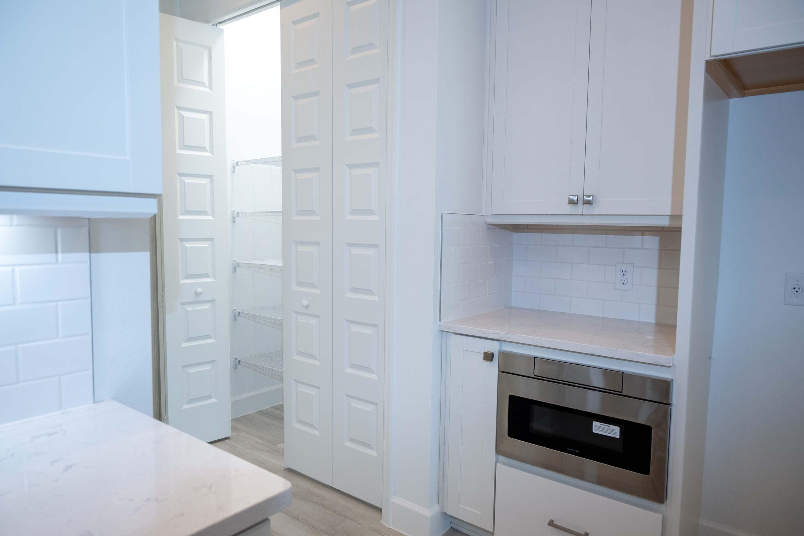 7809 Cache Crk Lane Melbourne, FL 32940 - Photo 6 of 35 a close view of a utility room with washer and dryer