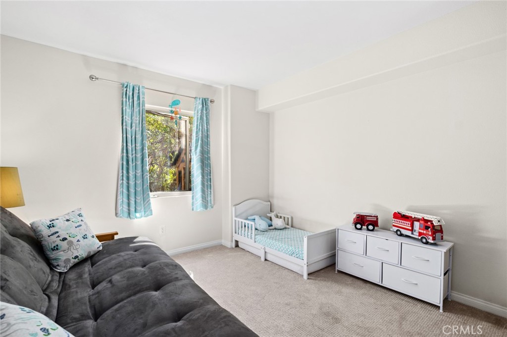 2072 Hidden Valley Canyon Road Laguna Beach, CA 92651 - Photo 14 of 26 a living room with furniture and a window