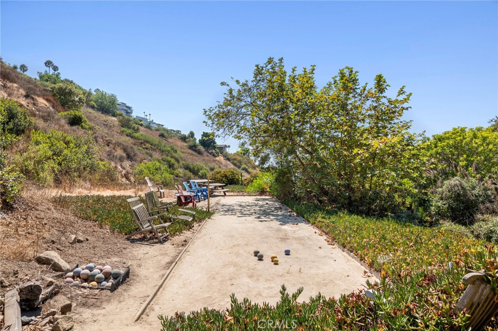 2072 Hidden Valley Canyon Road Laguna Beach, CA 92651 - Photo 25 of 26 a view of a park with plants and a large tree