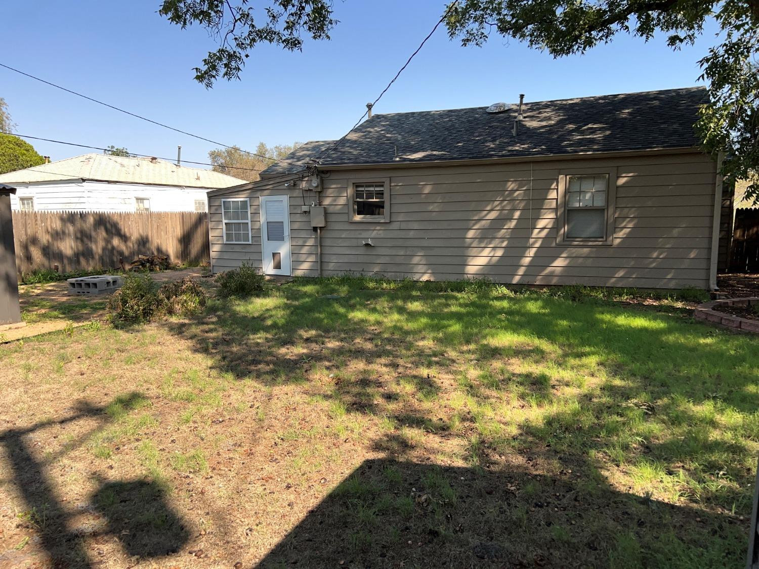 2509 29th Street Lubbock, TX 79410 - Photo 7 of 10 a view of a backyard of the house